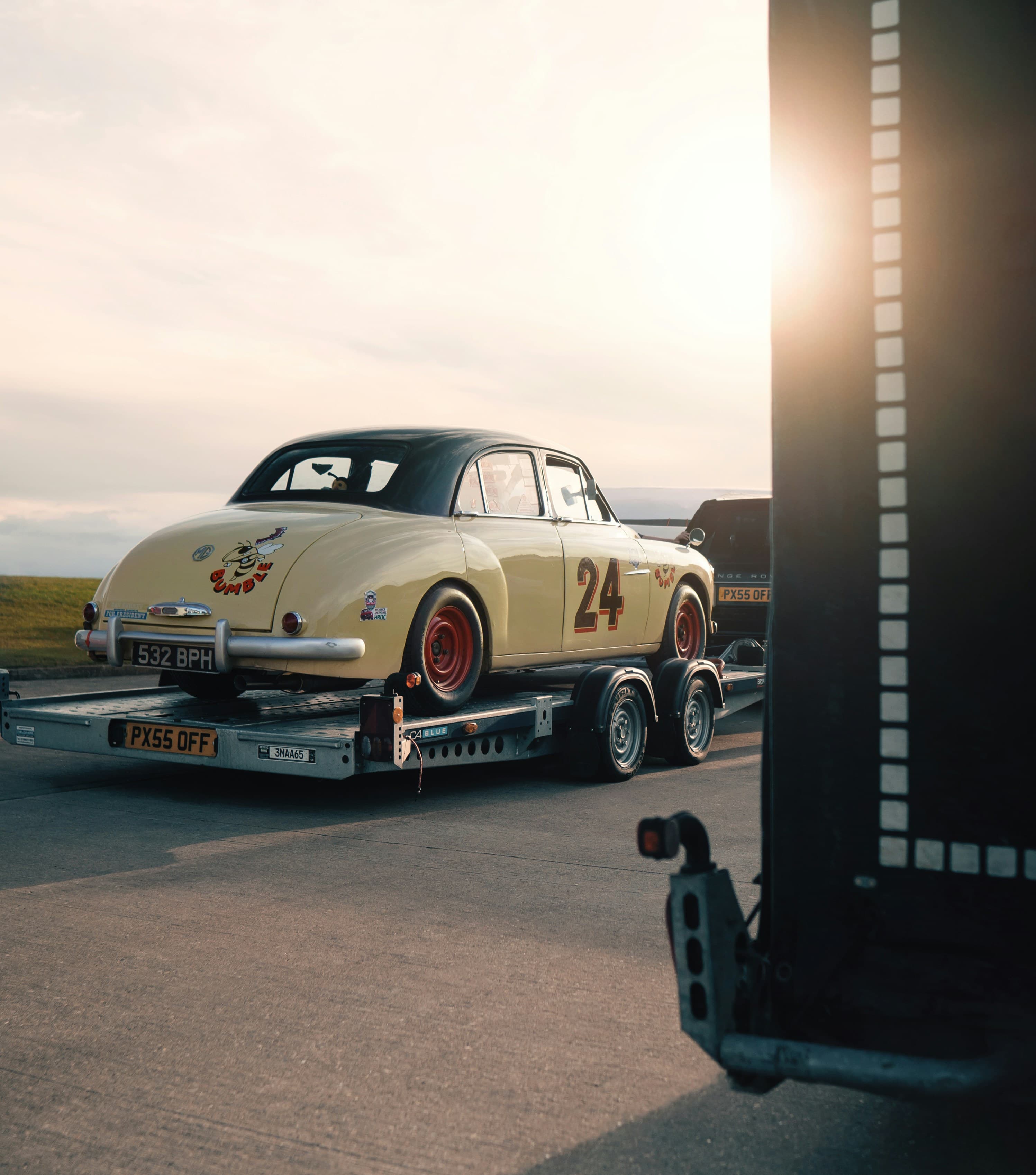 Vehicle being loaded on a flatbed tow truck